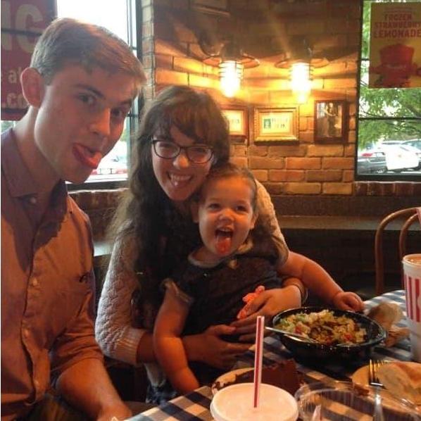 Miklos's first visit to Mundelein! Had to get the approval of the flower girl. And visit the cultural site that is Portillo's.