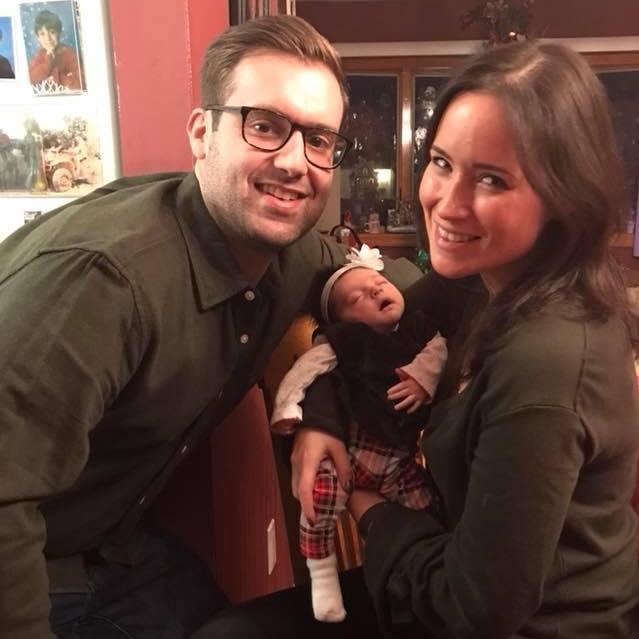 Rob and I with Livie at her first Christmas!