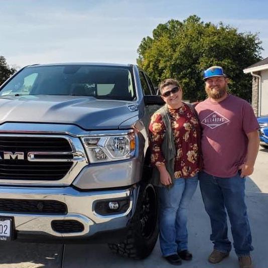 Maigen & Kyle's first large purchase. 6 weeks later Miss Daisy kept them safe when they hit black ice on their way home.