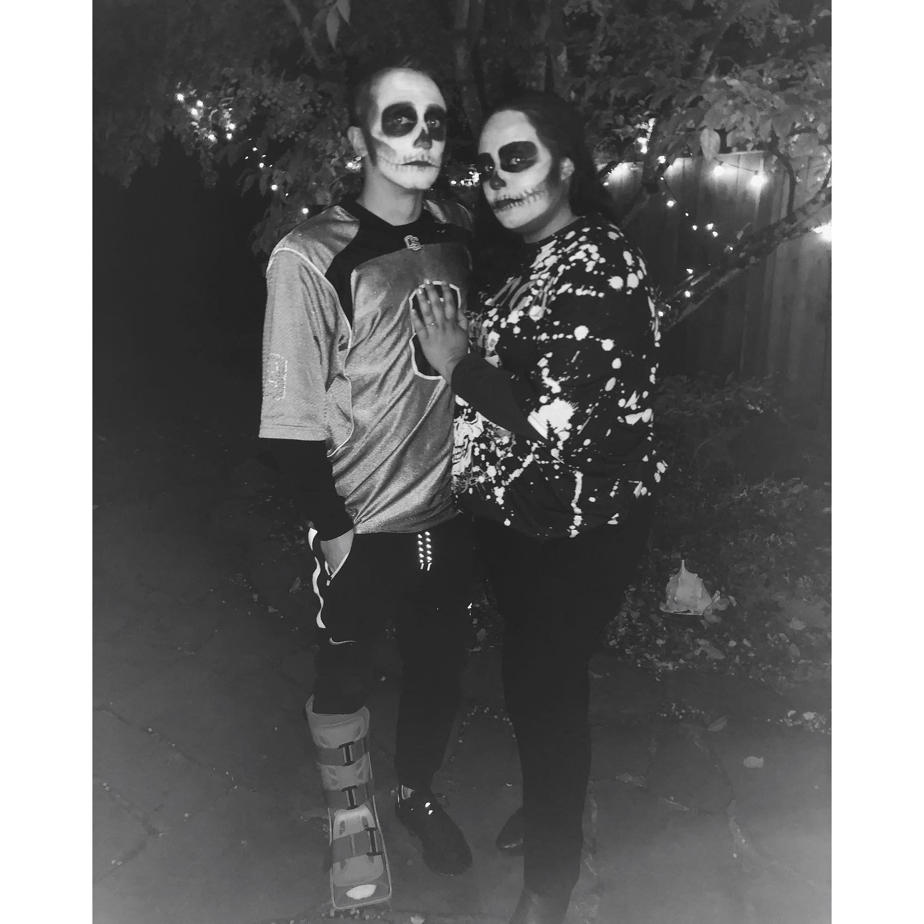 Dressing up as skeletons for our best friends Halloween party.
