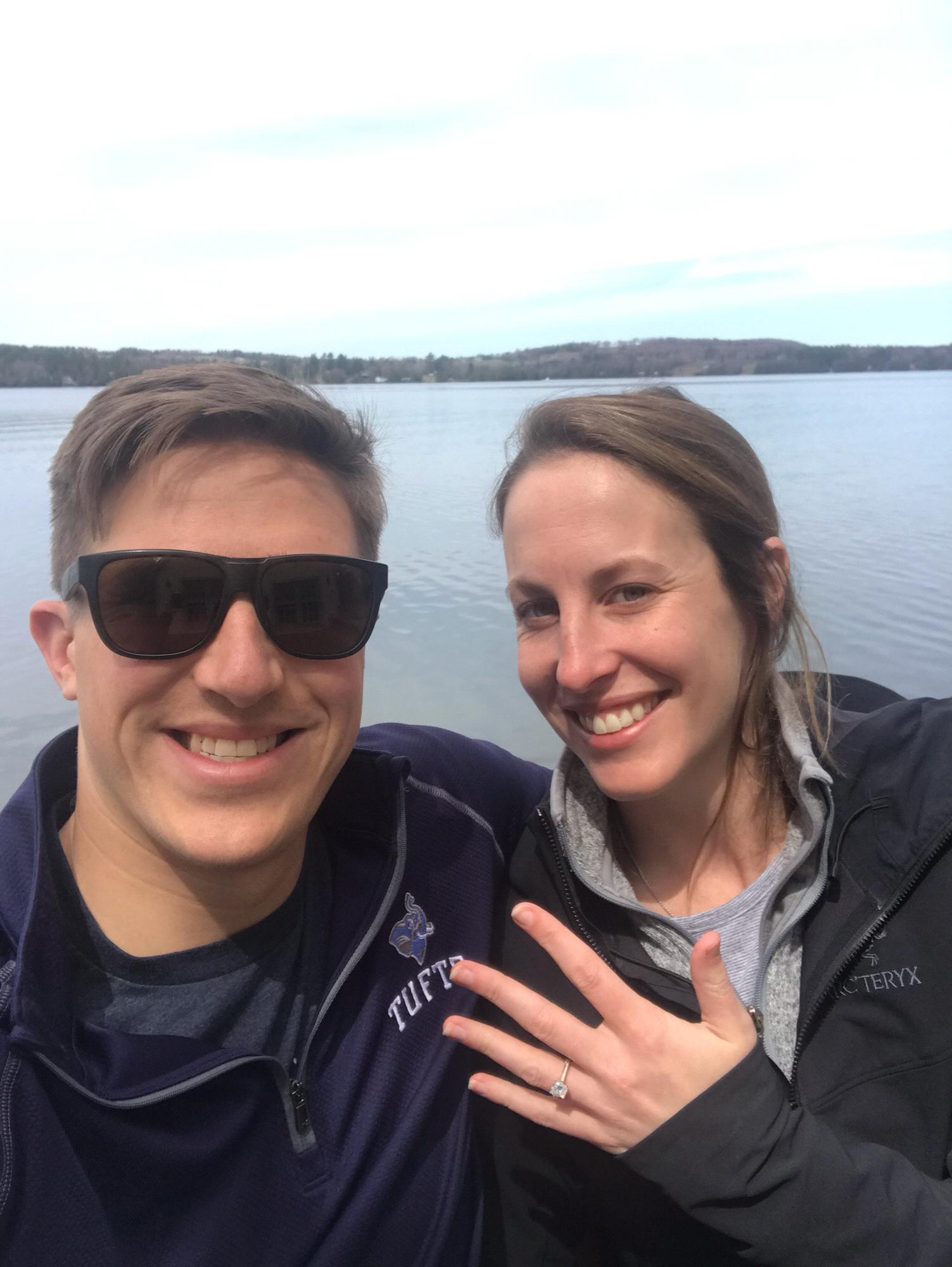 Than proposed on May 4, 2019 in Greensboro, VT. We were walking Mookie in the woods and came upon a snowy clearing. Than knelt down to make a snowball, and pulled out a ring!