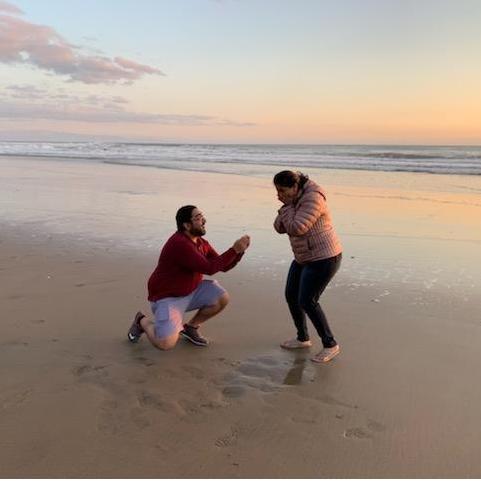 She made me propose again, this time on the beach.