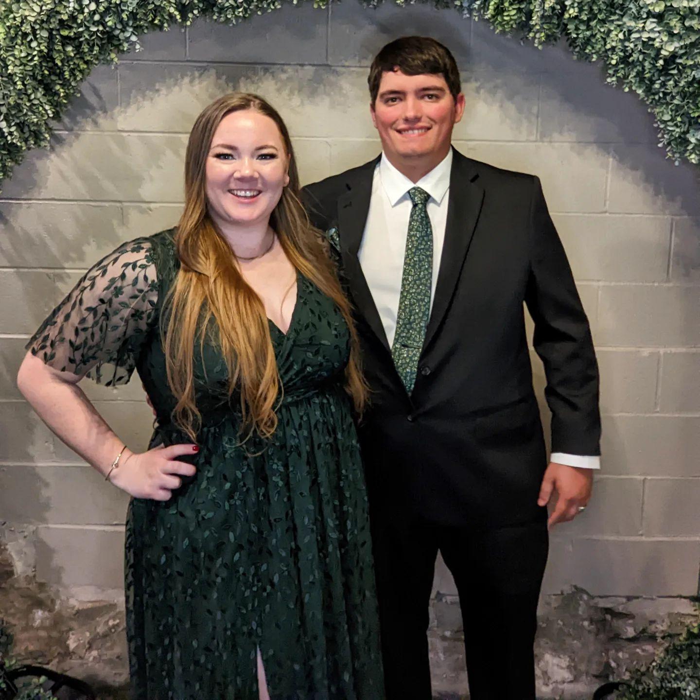 Tori and Tom at Tom's brother's wedding in 2022. Congratulations Max and Hannah!