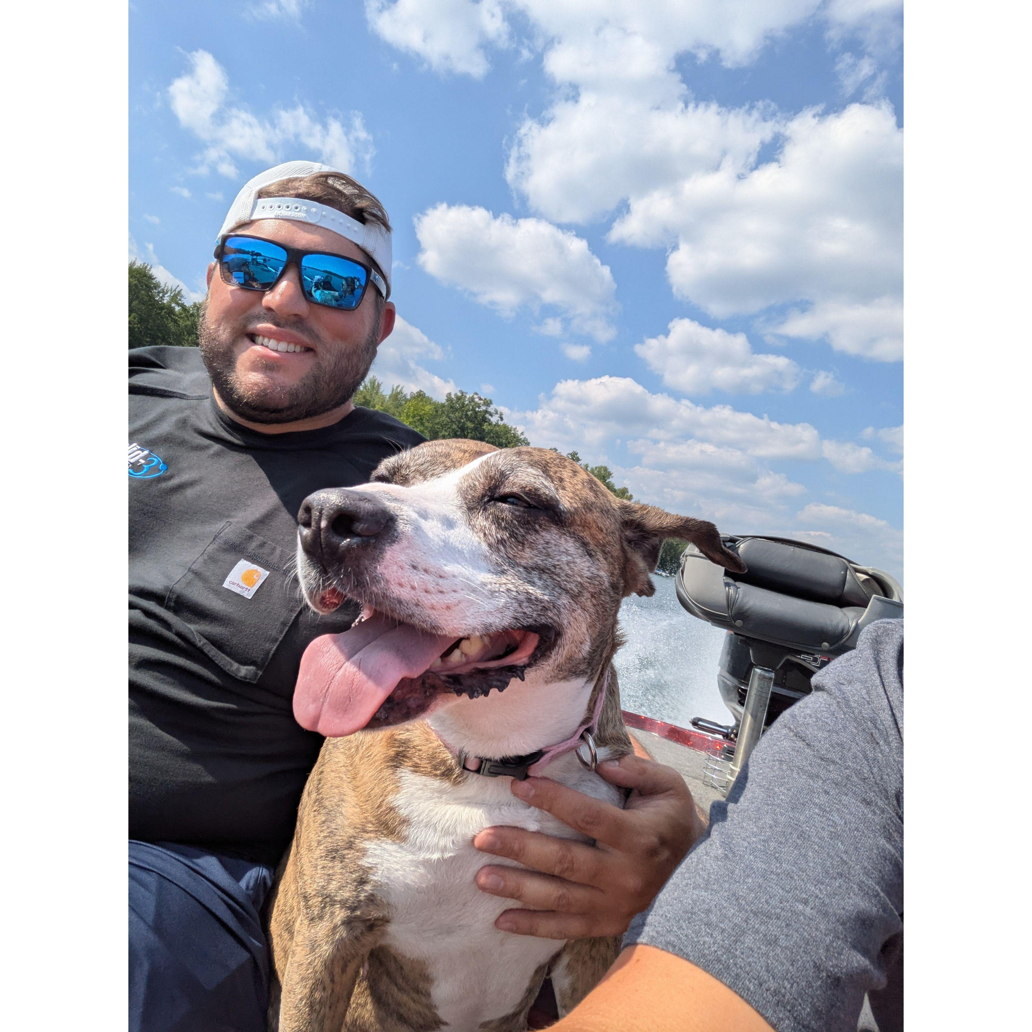 Riley loves boat rides & Adam