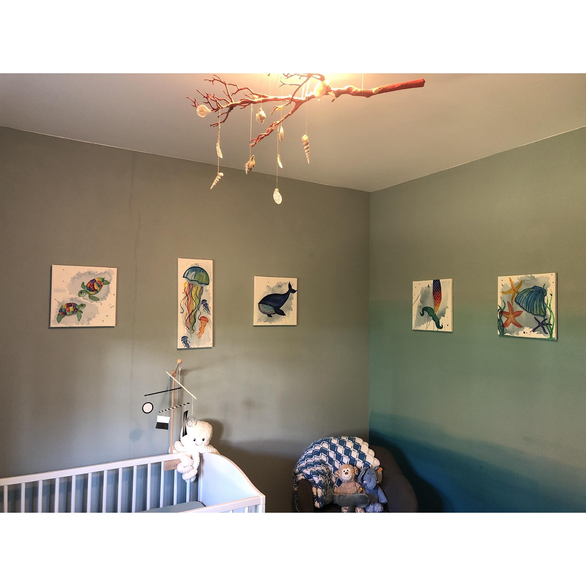 Hand-painted ocean pictures in baby room!