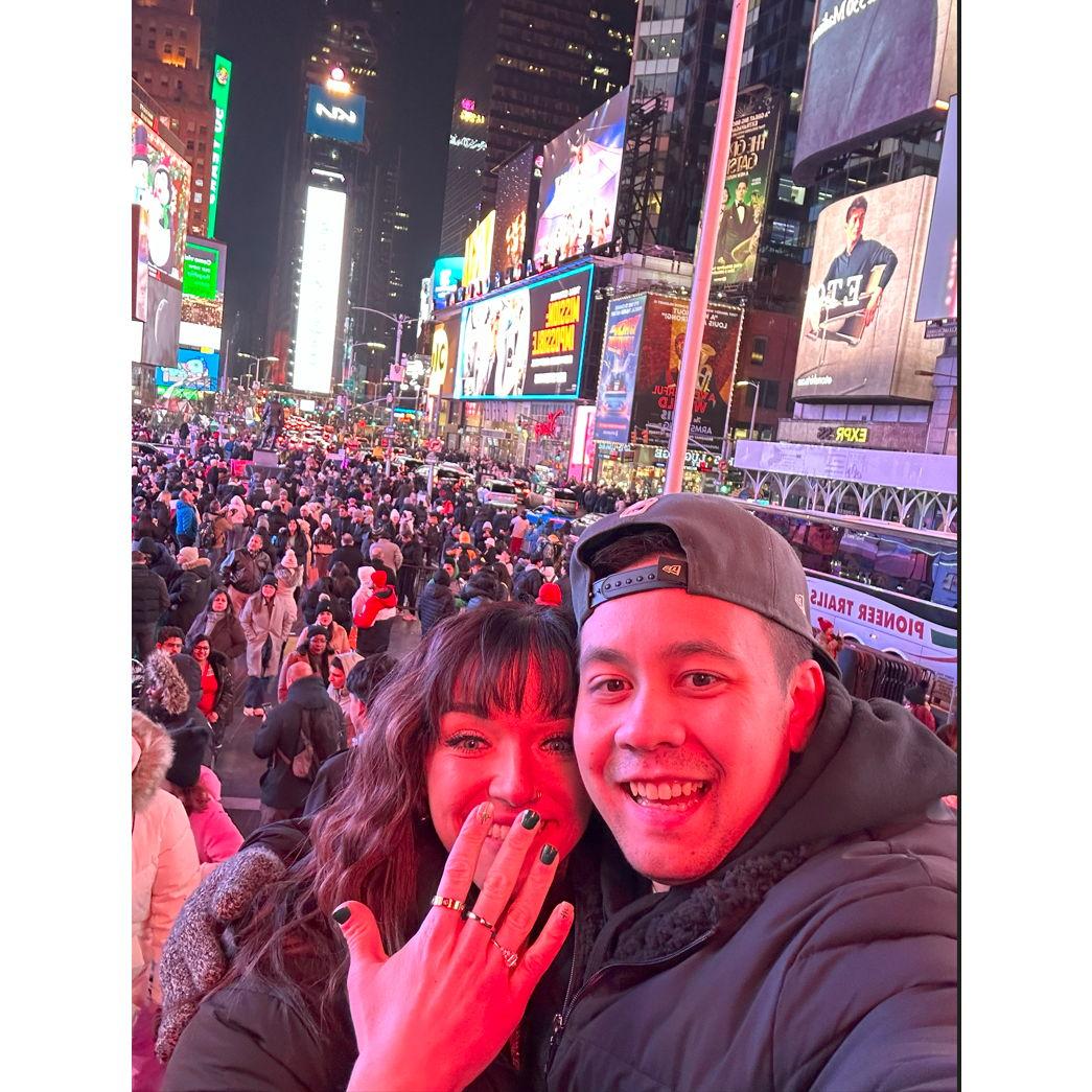 Celebrating in Times Square after getting engaged!
