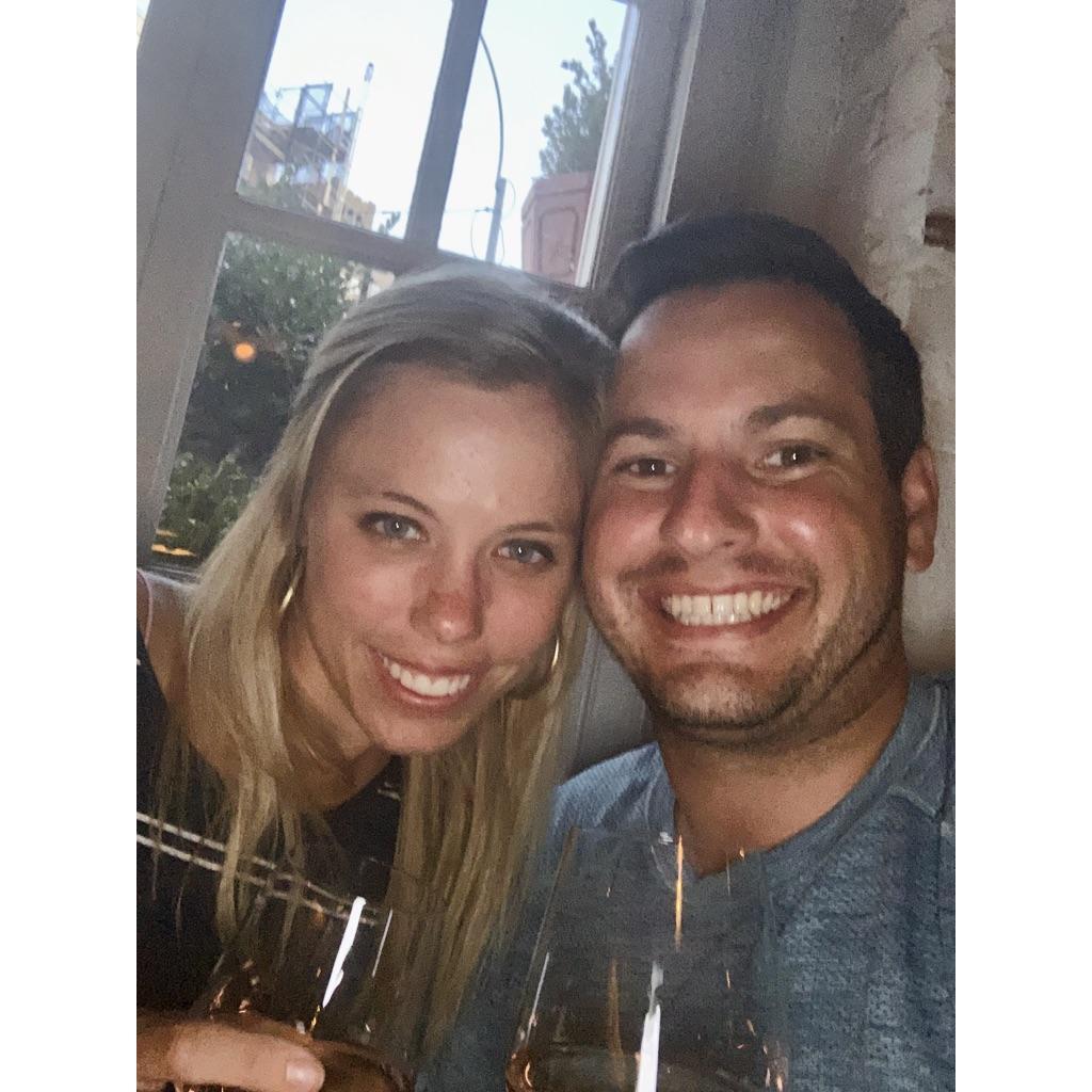 One of our first photos together- at one of our favorite wine bars in NYC!