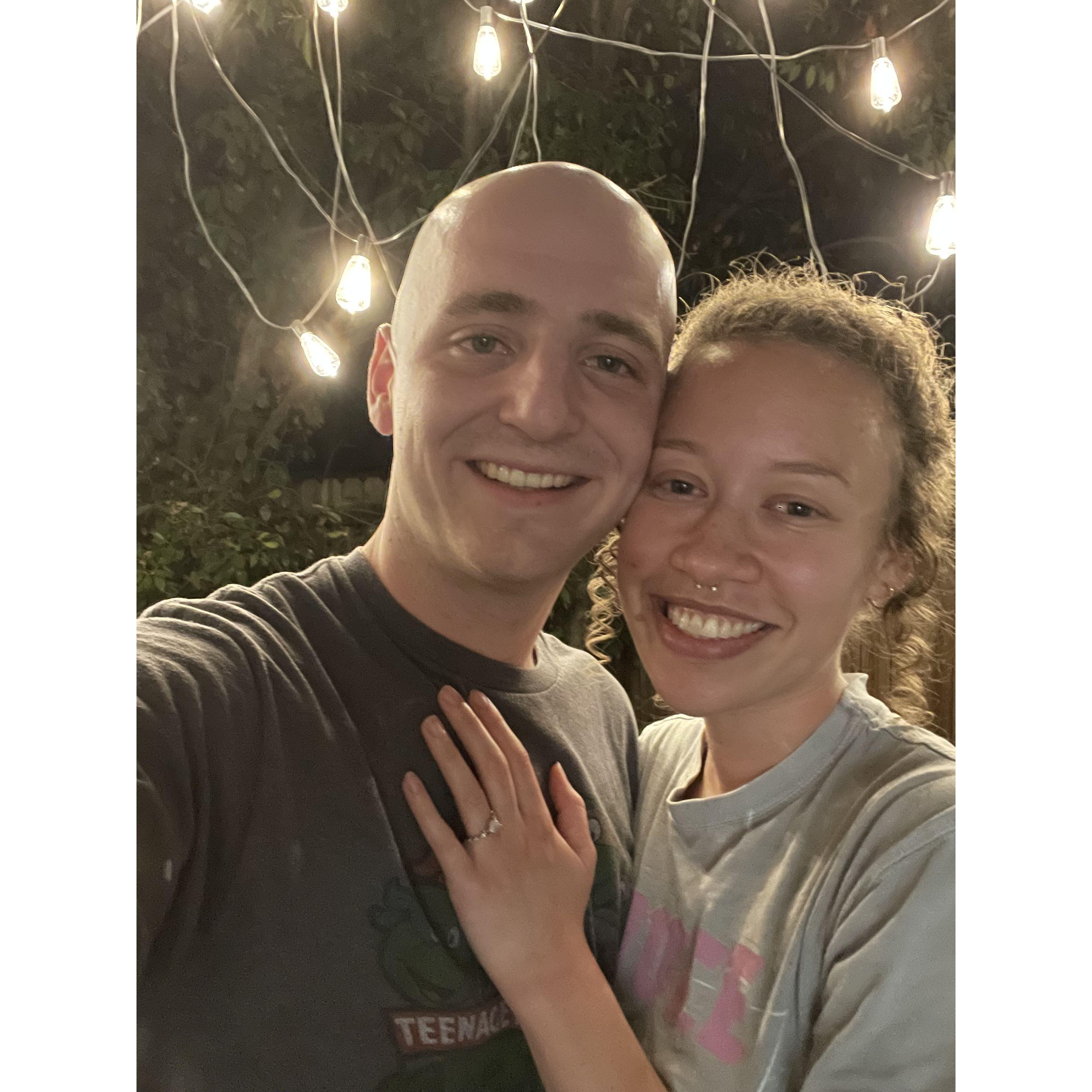 After celebrating our 7 year anniversary together we got in engaged in 2024! Bailey decorated our backyard patio with lights and had Lucy right next to him when he asked the question.