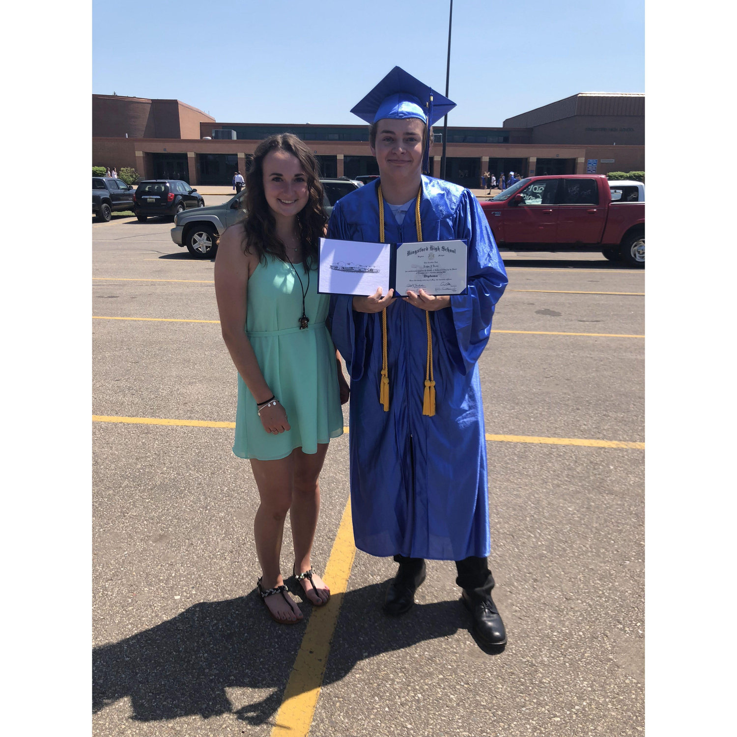Logan Graduating High School! Mallory was NOT late for this photo...