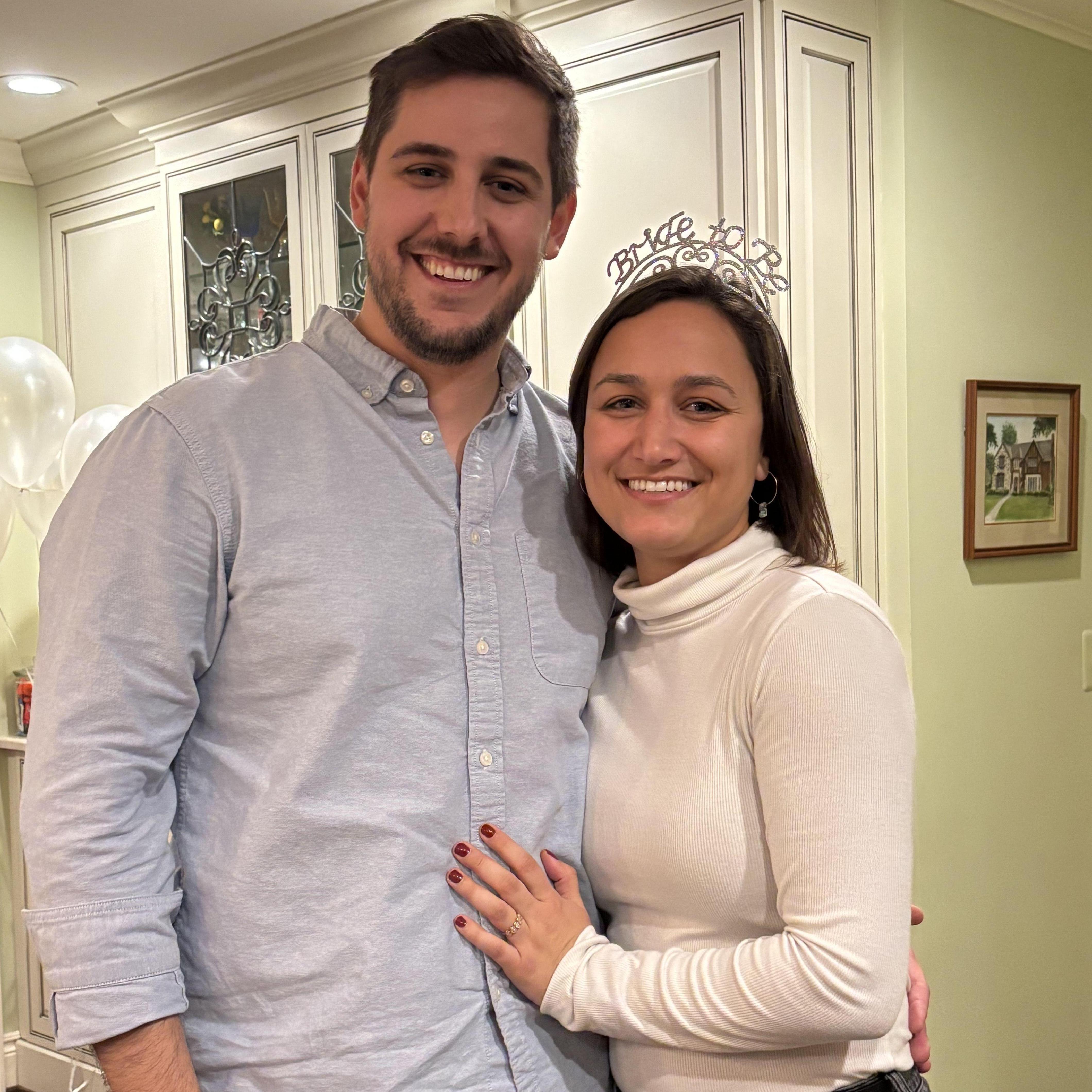 Taken at our engagement party, that Adam surprised Christine with!