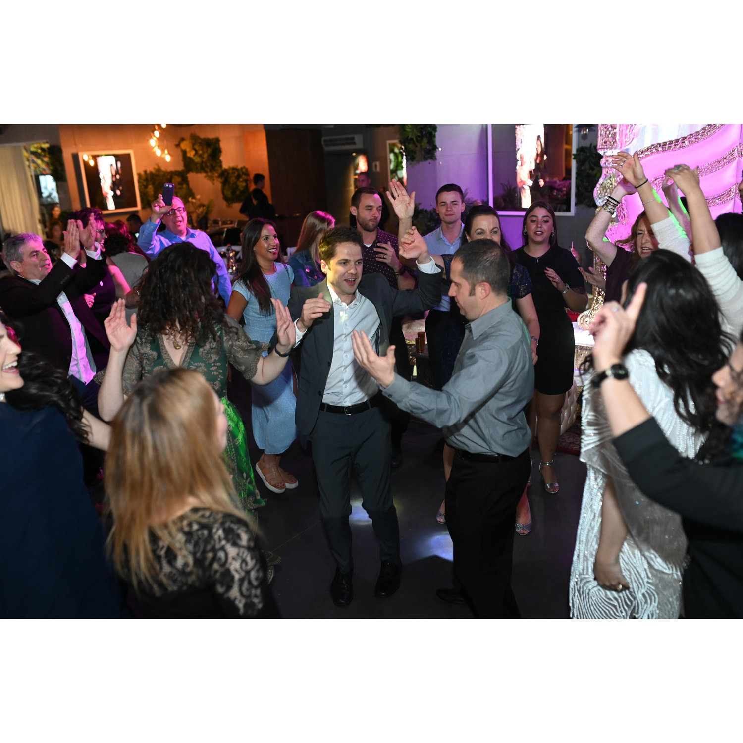 Andrew's brother, Dan, who came with Andrew's parents and Godmother all the way from Omaha, Nebraska, embracing some Israeli dance moves. Nice work, Dan.
