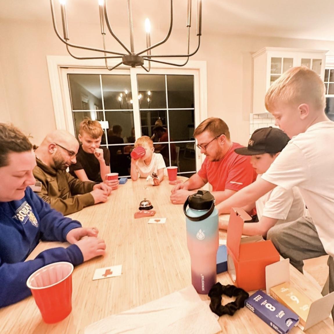 Game time with our officiant (Jon) and his family.