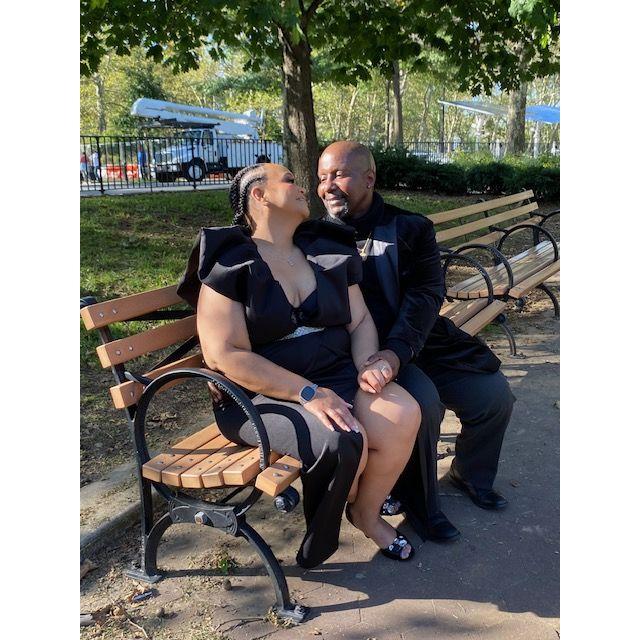 A personal pic of us sitting on a park bench during our engagement shoot - 10/1/2023