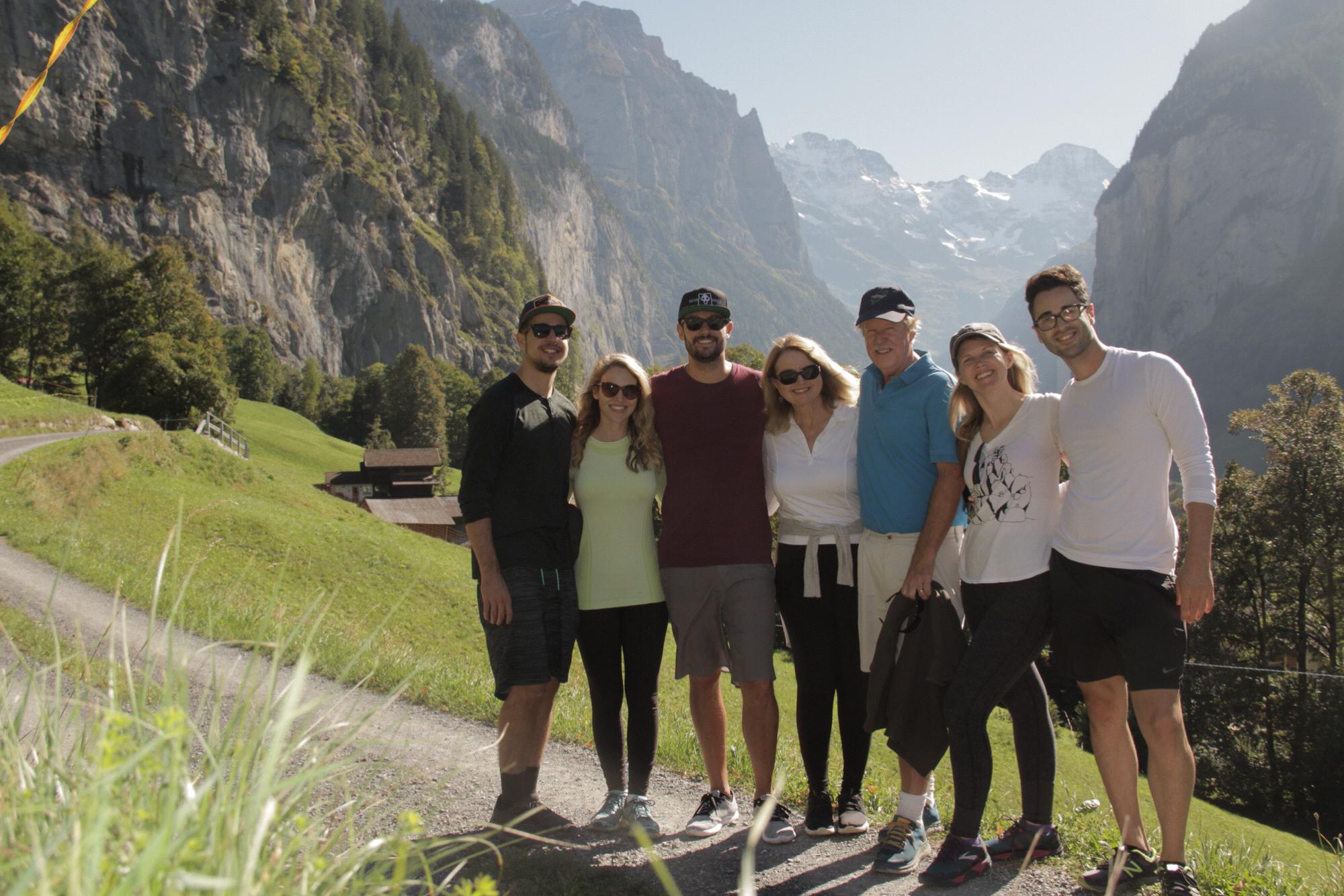 Lundberg Family picture in Wengen, Switzerland (missing Kaye!) This place is beyond words- too beautiful to believe even when you see it with your own eyes. Not to mention all the fluffy cows! <3