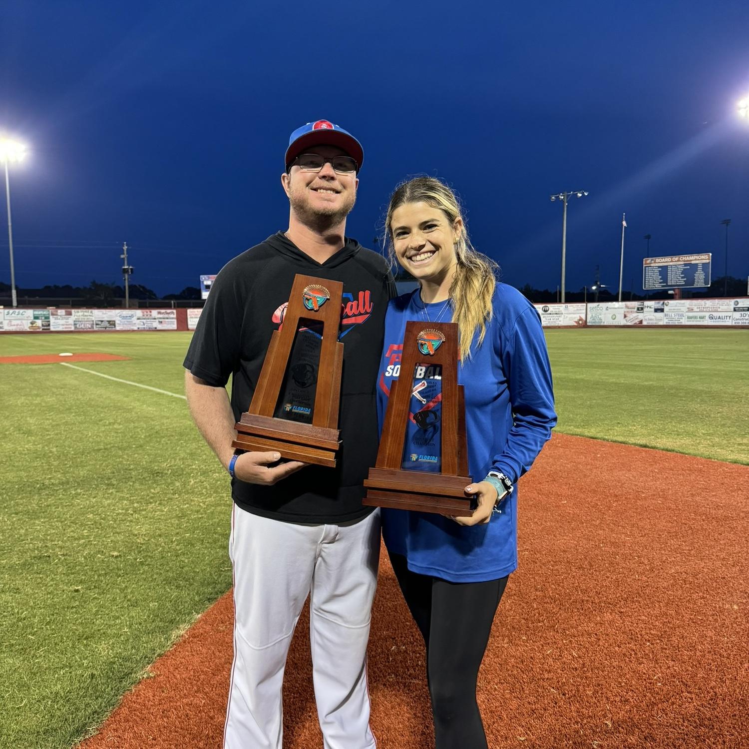 District Champs for the varsity high school baseball & softball teams we coach