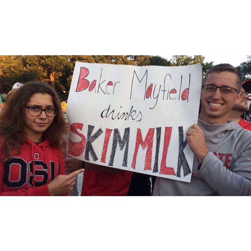 Our pre-dating days (and first picture we took together). He still laughs about her frizzy hair from that college game day