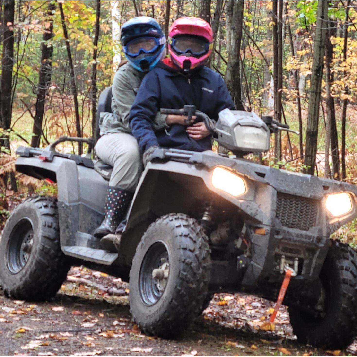 Chris and I together for a fall ride on our quad (Fall 2020).