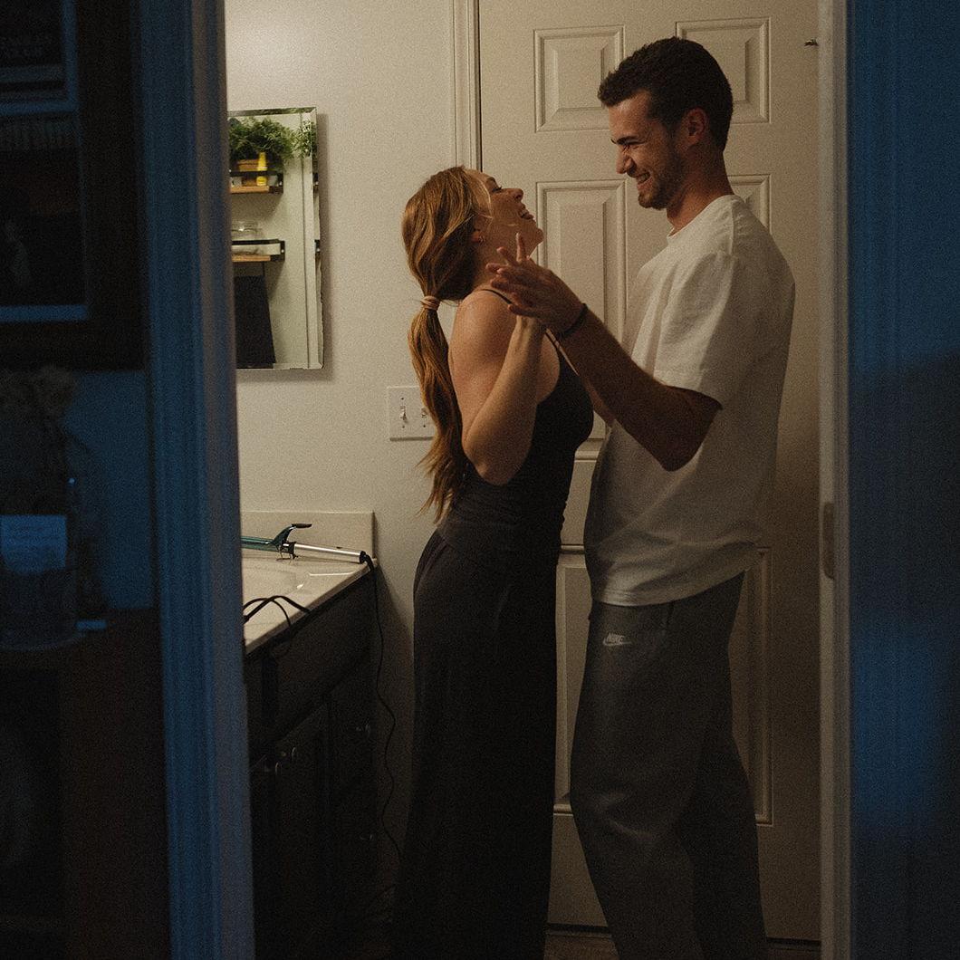 A photographer friend told us she wanted to capture those sweet "getting ready for date night" moments of us. Little did El know she was actually getting ready for Jack to propose later that evening!