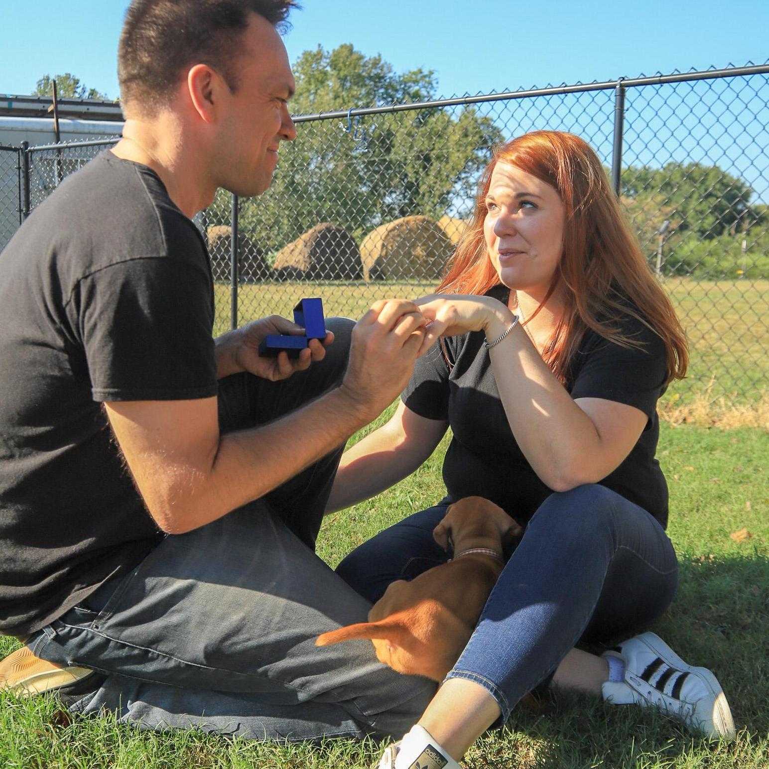 Rob proposed the best way possible...in a pile of puppies.
