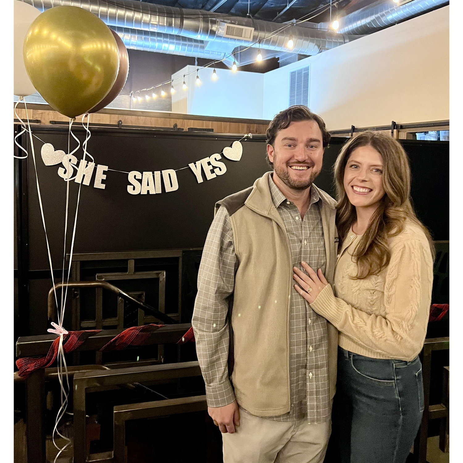 With the help of their parents, John surprised Kelsey with a surprise engagement party. :)