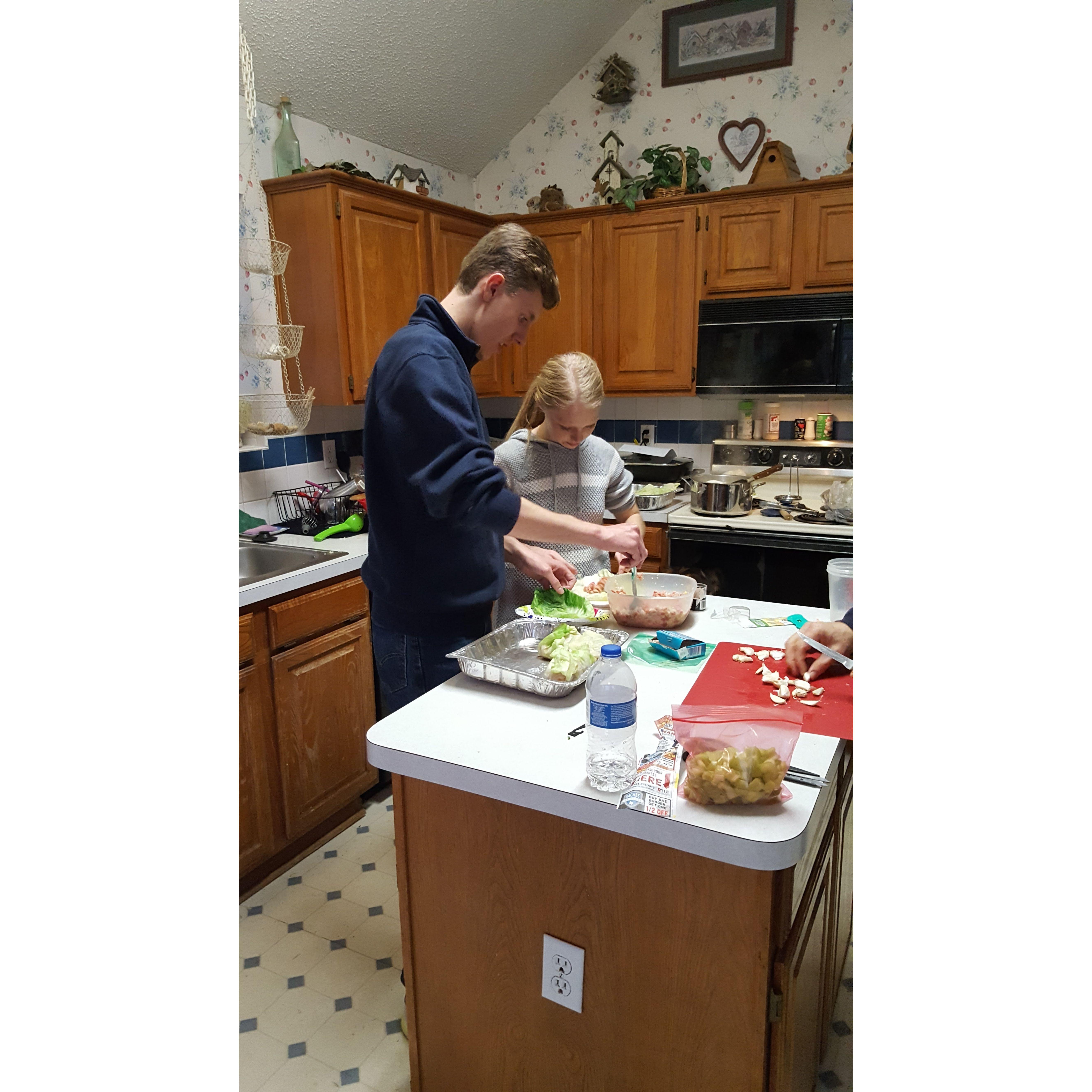 Teaching Dylan how to make cabbage rolls - December 31st, 2017