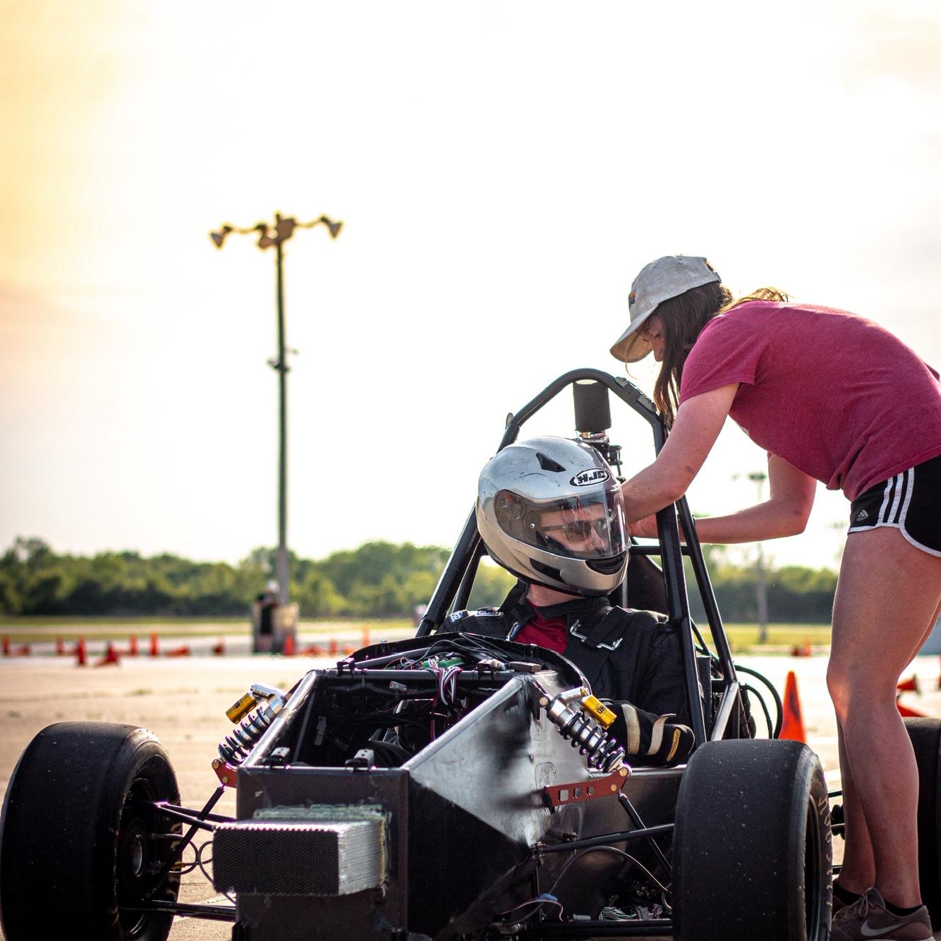Here Julia is making a quick adjustment while James is taking the SRT car through some testing sessions, 2023.
