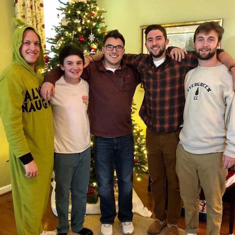 Megan's family does a tree-trimming party every year at her grandparents house in DE. Adam's first year attending, he showed up in his Grinch costume. Everyone loved it!