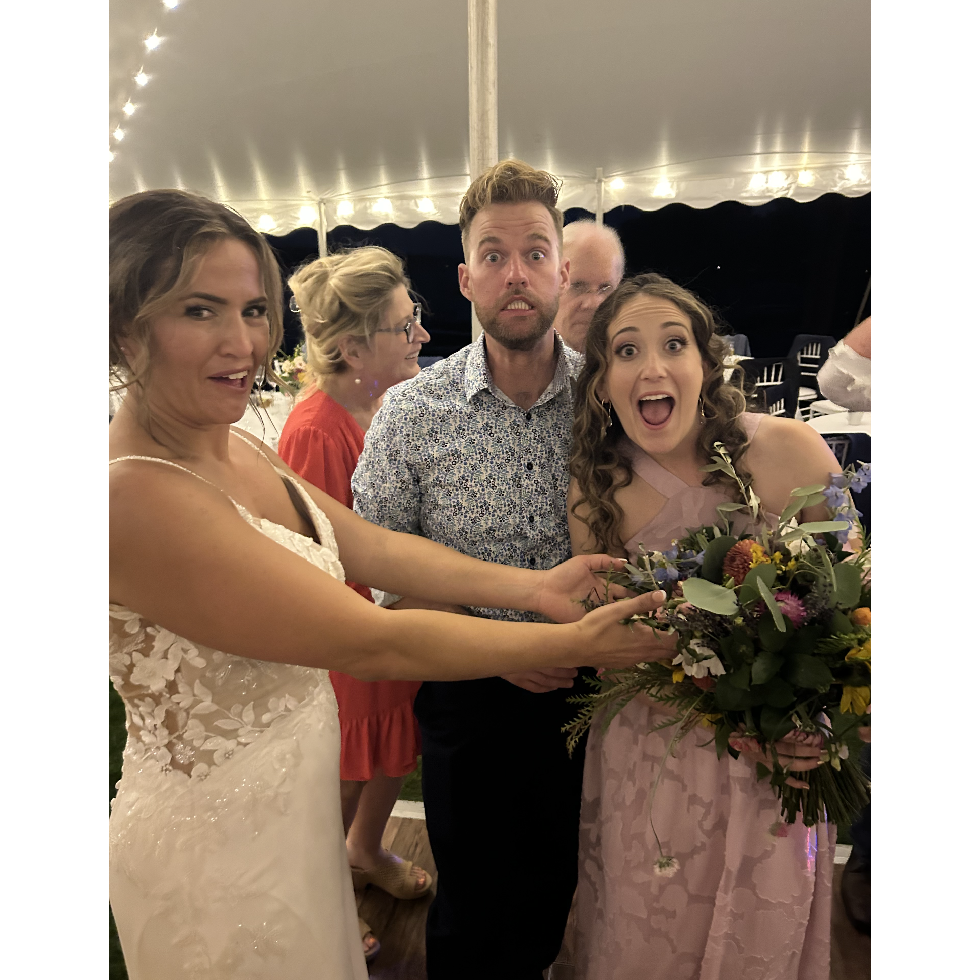 Andy was not quite prepared for Alexa to catch the bouquet (even though he had asked his grandfather and her parents months prior ;))