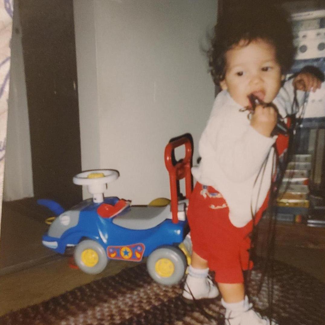 Erick spent the two years of toddlerhood eating tape cassettes in the natural wonderland of Kodiak, Alaska.