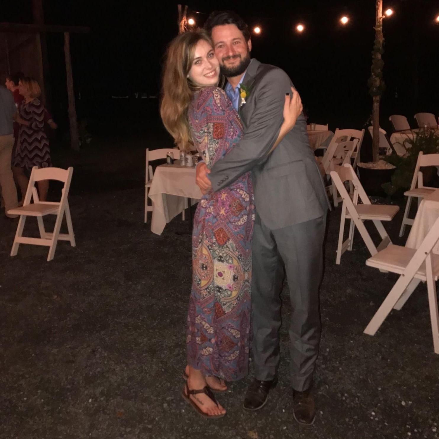 First photo together, making the town whisper at a local wedding. 