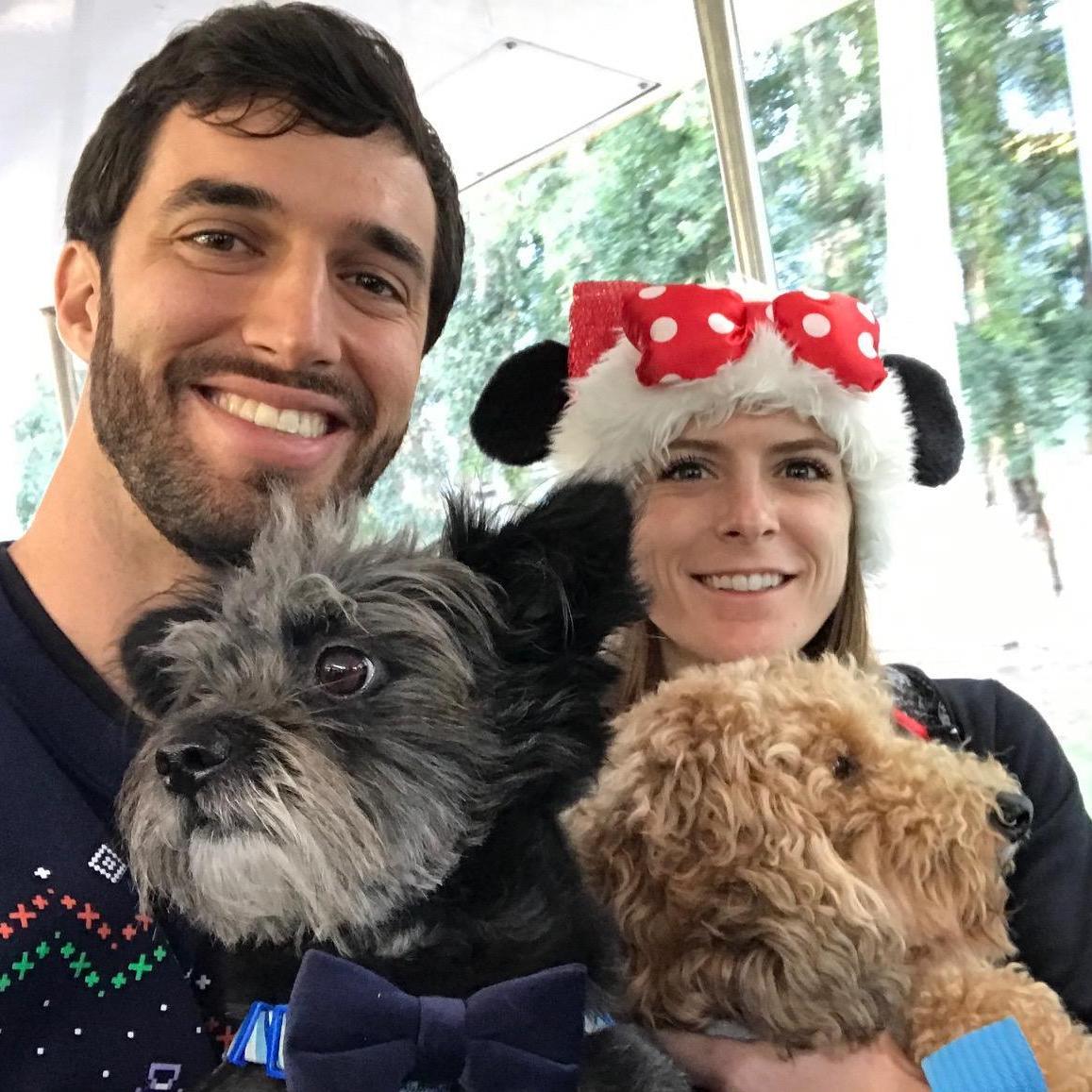 Celebrating the holiday season with Suki and Gimli on the tram at Disneyland in December 2018