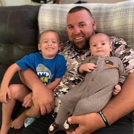 Brandon Smith with 2 of his boys Cam and Finley.