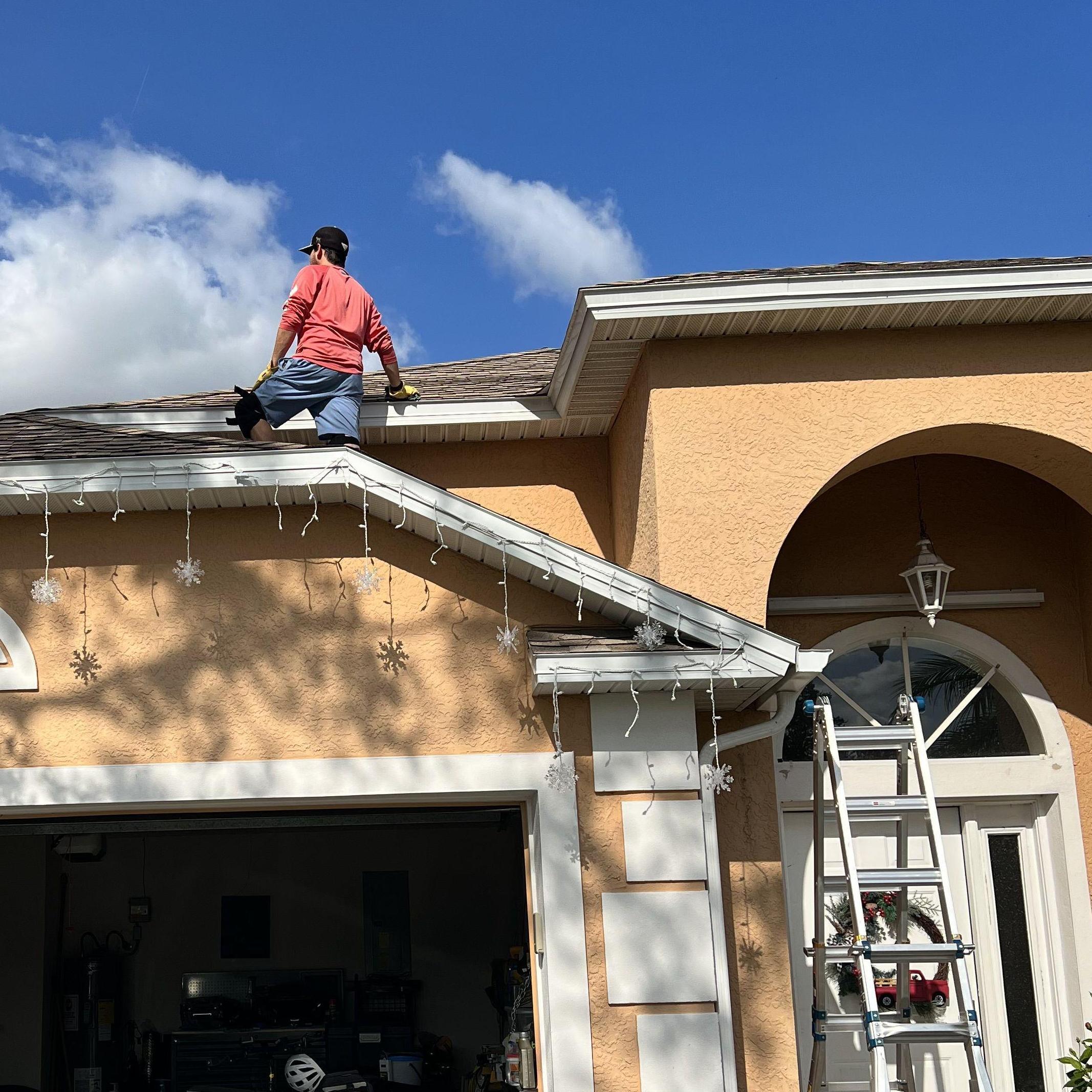 Attempting to hang Christmas lights in 2022