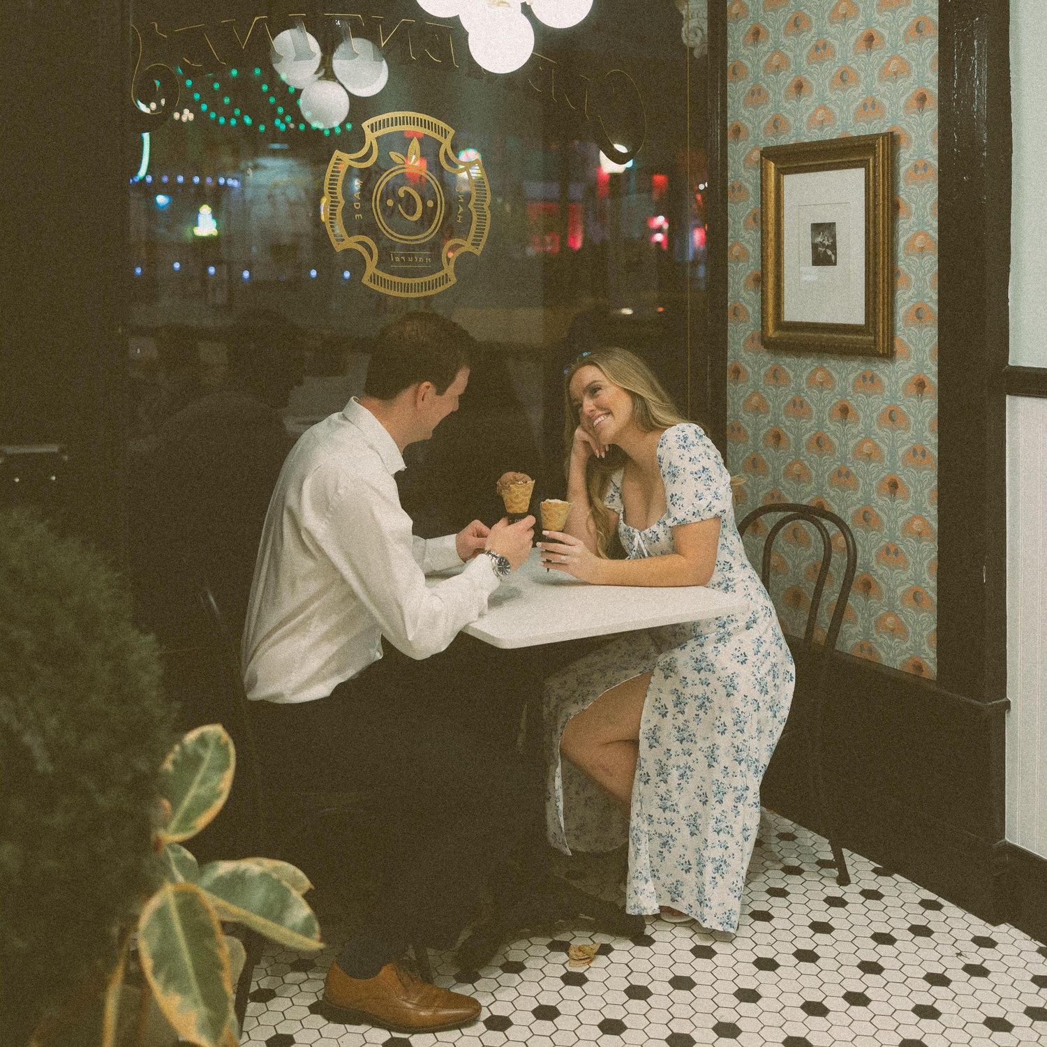 An engagement photo at Clementine's (our guilty pleasure in South City)