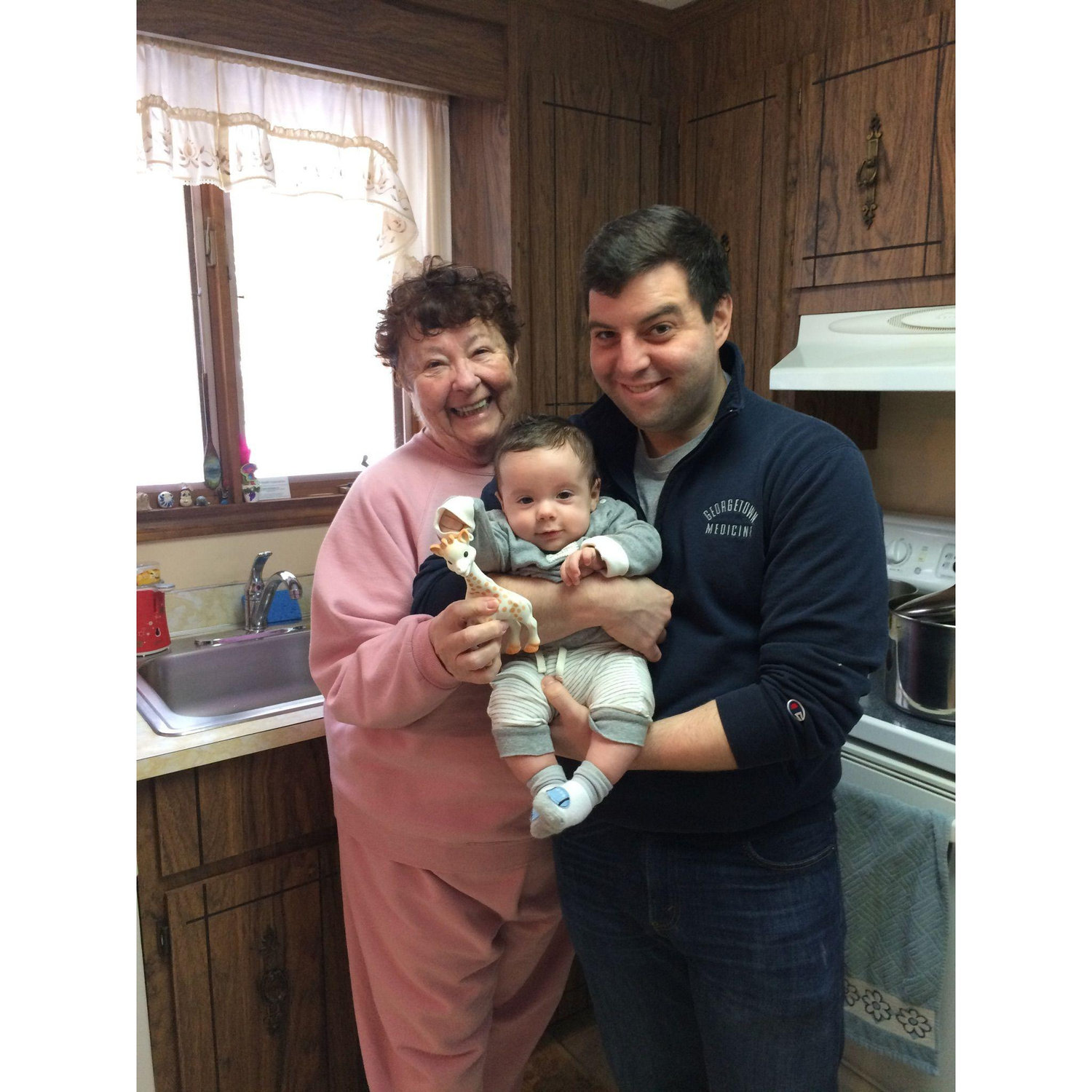 Matt and Grandma with new cousin