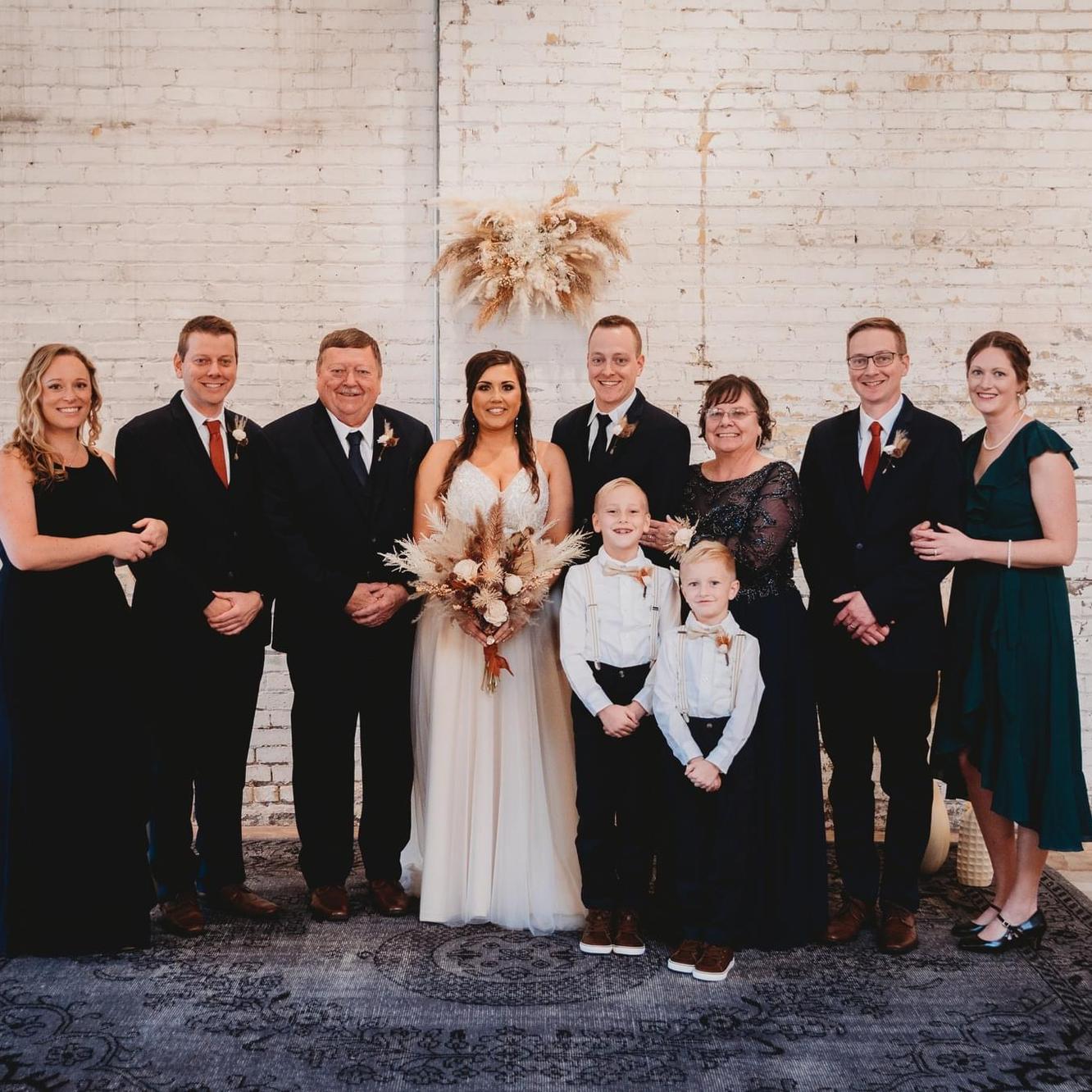 With Greg’s family at Eric and Taylor’s wedding in November 2022.
