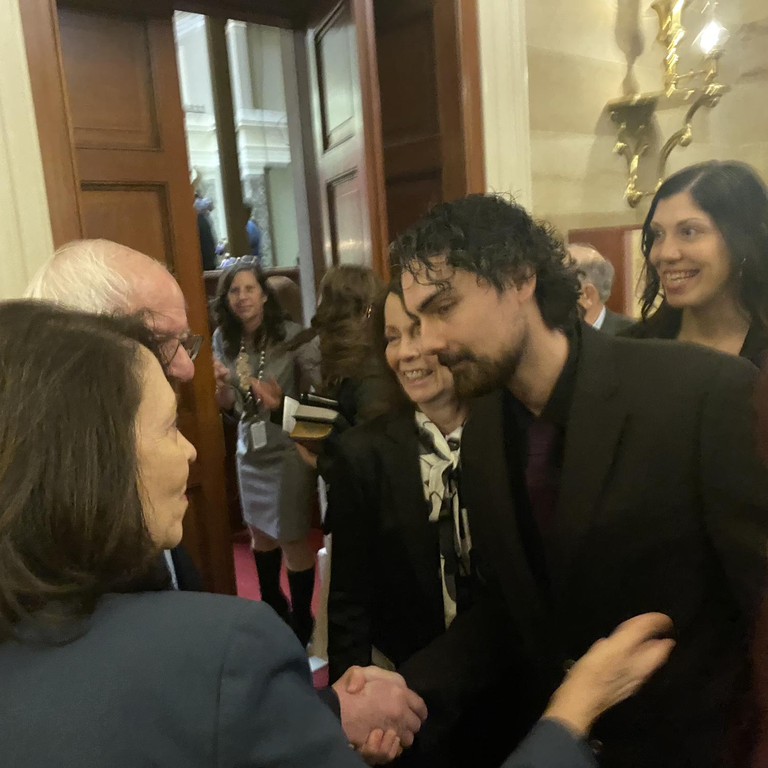 Garrett telling Bernie sanders the story of how their photo years ago, was part of how we connected.