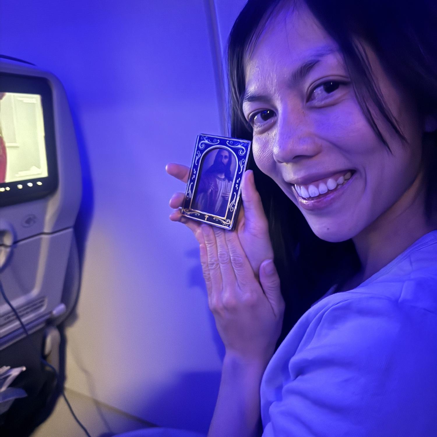 Eliza (Maid of Honor) with Ben's photo of Jesus.  Jesus has traveled all over the USA in Ben's backpack!