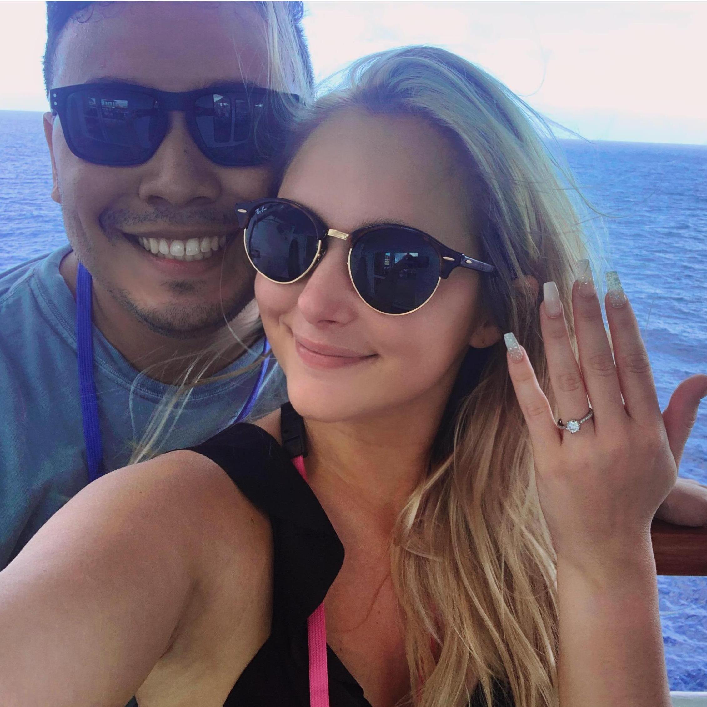 Day after the proposal! Showing off the bling.
Middle of Ocean, 2020