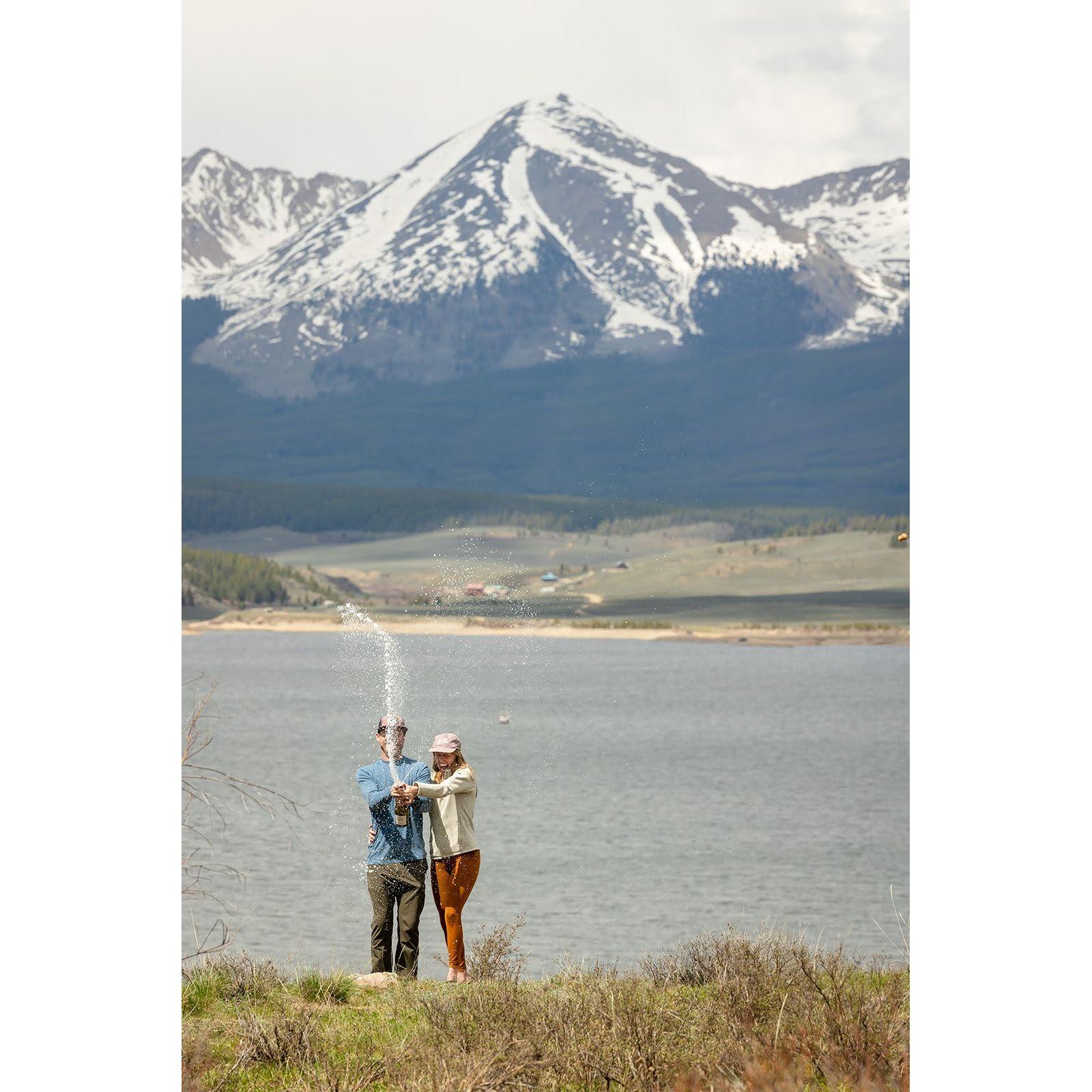Popping champagne to celebrate Megan saying 'yes' at Taylor Park Reservoir, CO
[May 2023]