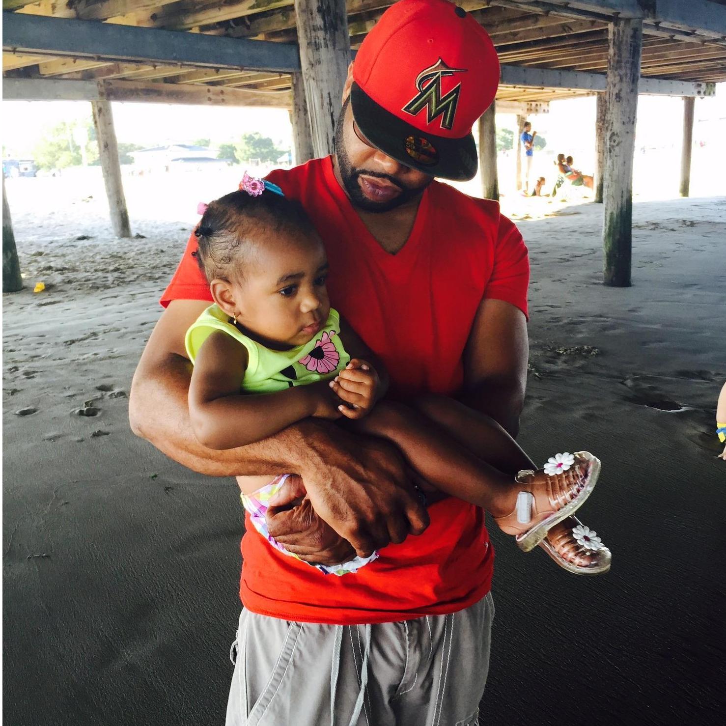 Janiyah finally warming up to her baebae by letting him hold her lol. July 2015