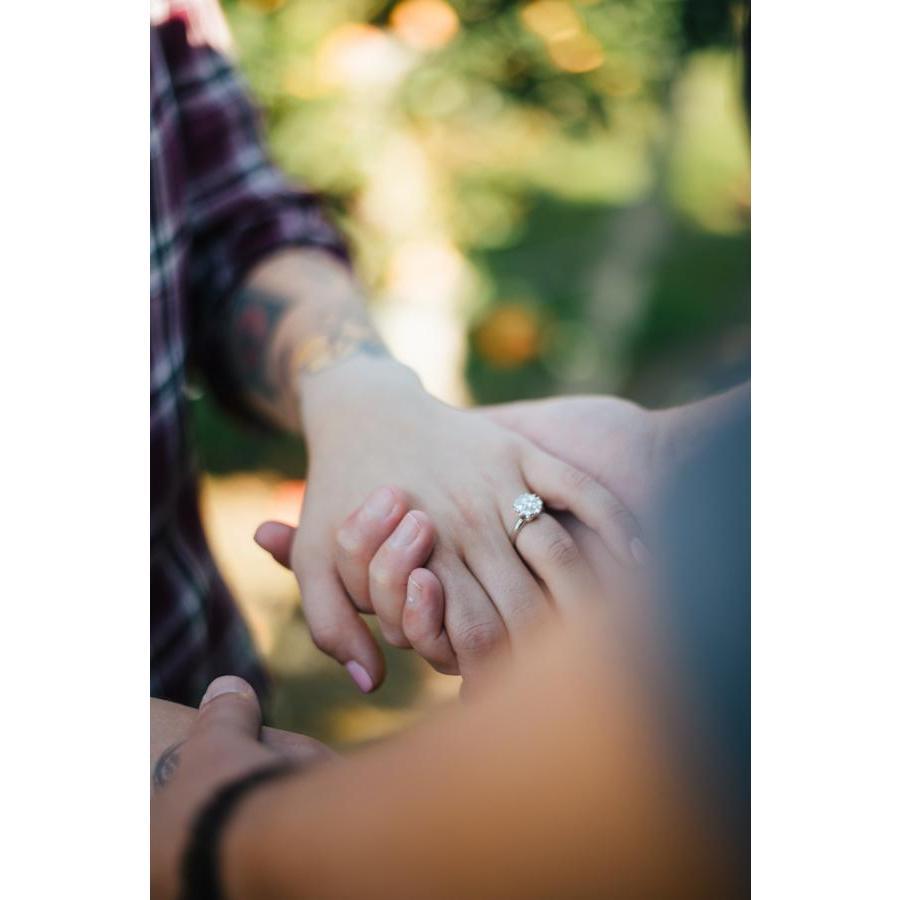 Our engagement ring was Sam's great-grandmother's, Gertrude. It was given to her as an anniversary gift by Samantha's great-grandfather. Gertie and Charles Rego were married into their golden years.