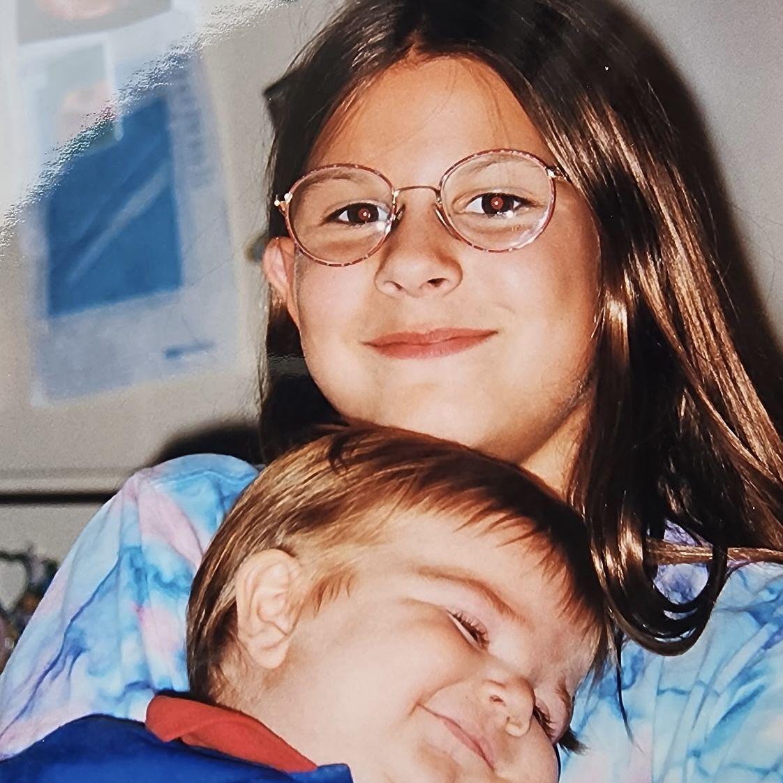 Rachel holding her little brother Justin