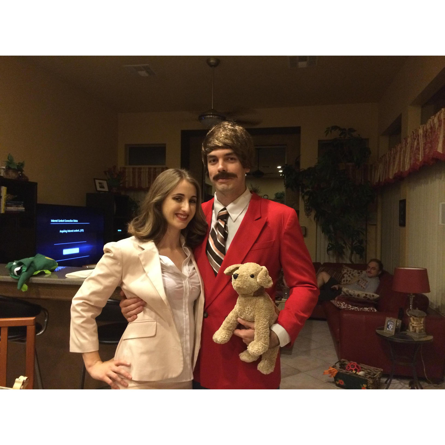 First-time Halloween Costume Champs: Ron Burgundy and Veronica Corningstone. "I'm Ron Burgundy?"