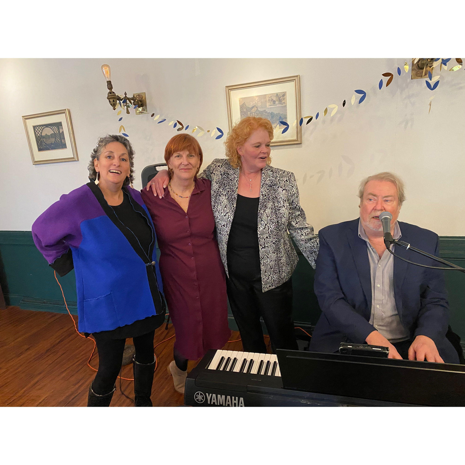 Christiana, Patrice, Elisabeth and Dave at the Piano