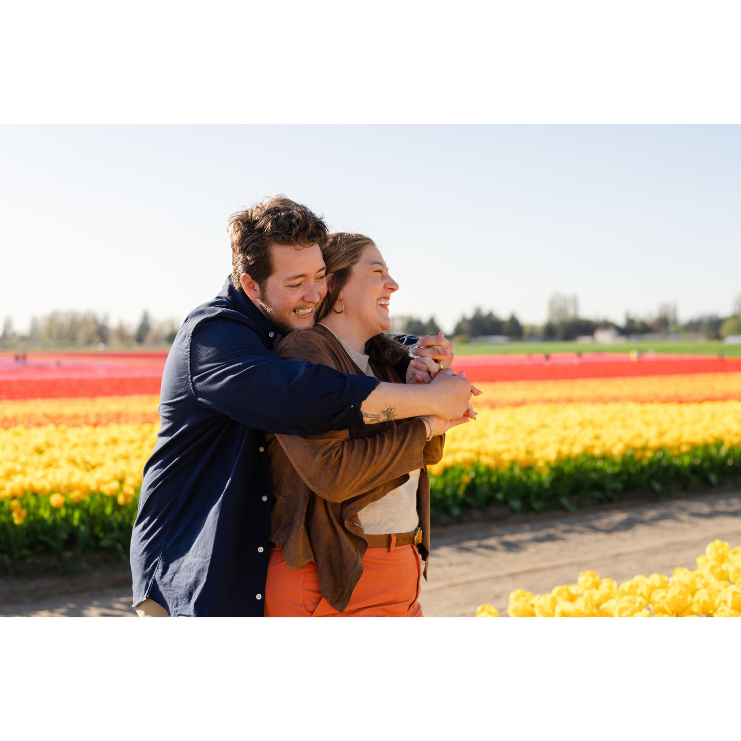 Engagement photos taken by the incredible Caylie Mash at Roozengaarde in Mount Vernon, WA for the tulip festival, one of our favorite events each year. April 2025