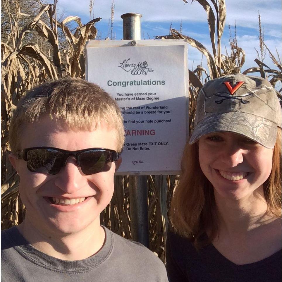 At a corn maze with friends before we were dating. Sean suggested we break into teams of 2 and asked me to be his partner. Little did we know he would ask me to be his forever partner 8 years later!