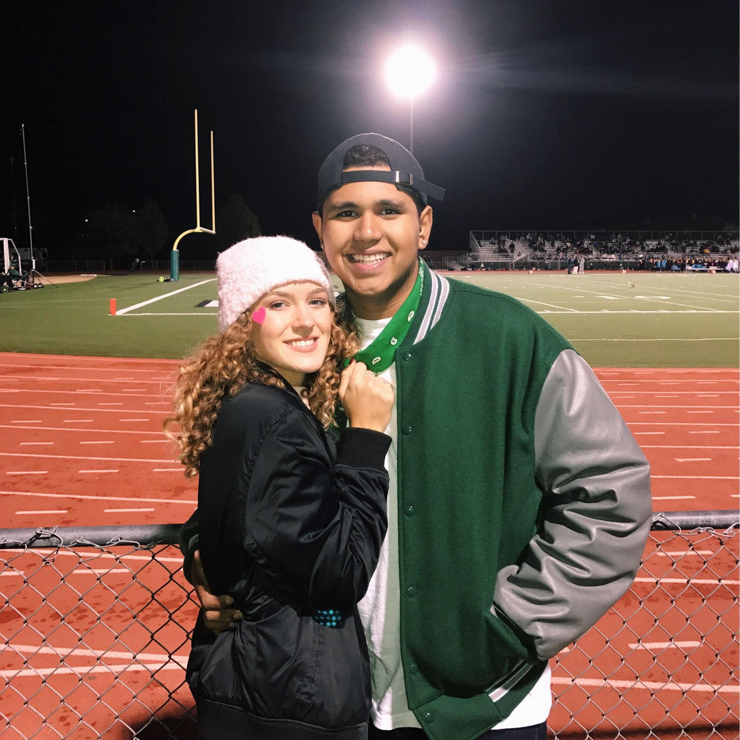 Together at a football game when we were sophomores in high school / Juntos en un partido de fútbol cuando estábamos en segundo año de secundaria (2017)
