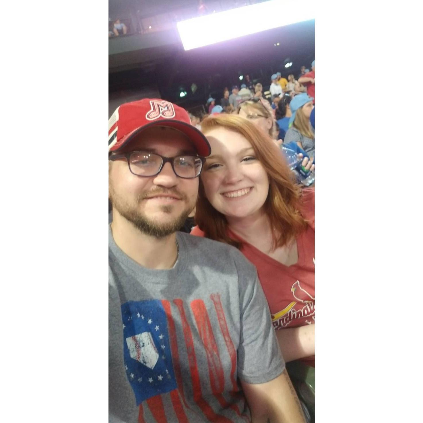 Our first photo together at a Red Birds game in Memphis. Also the first night we said “I love you.”