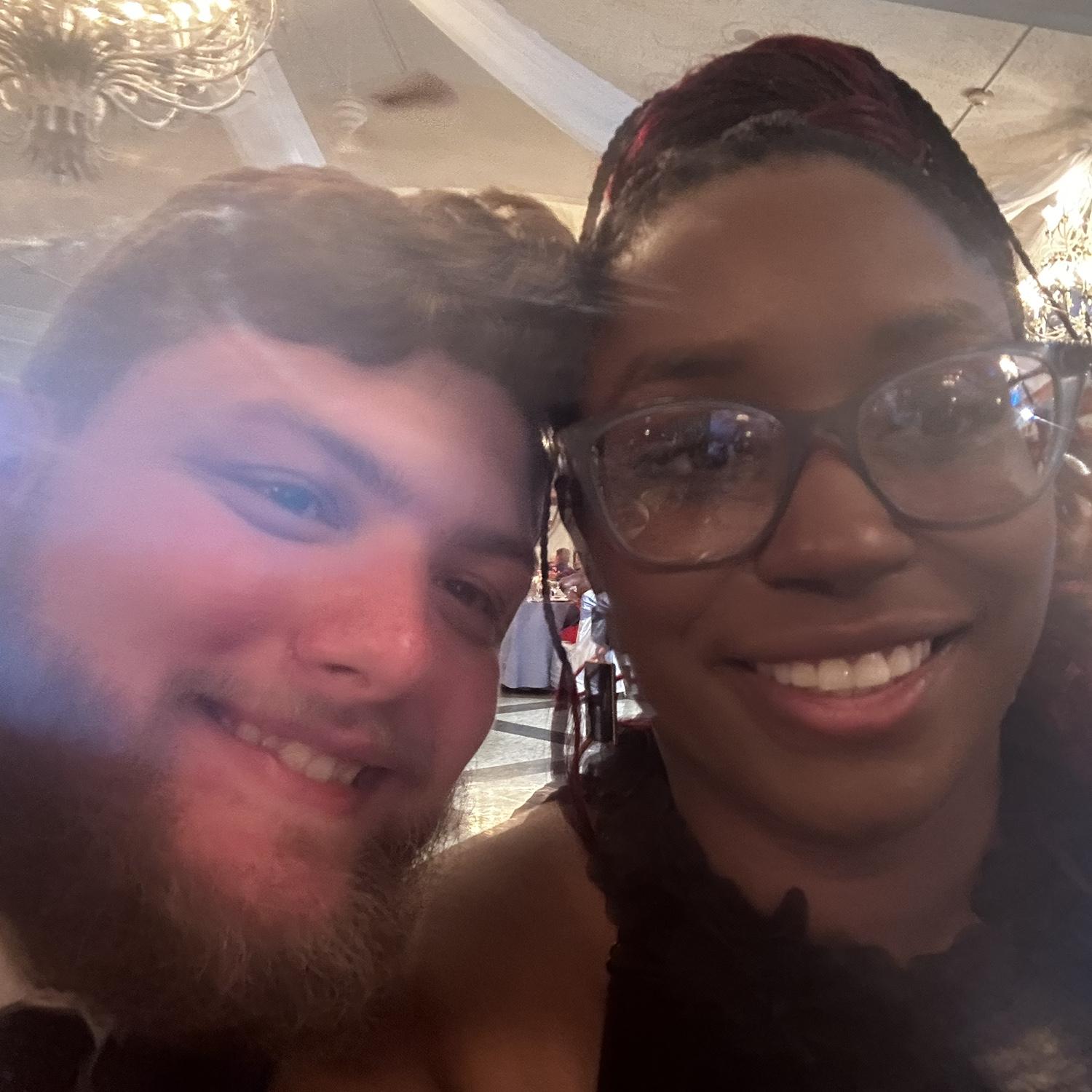 Cheesing it up at a wedding